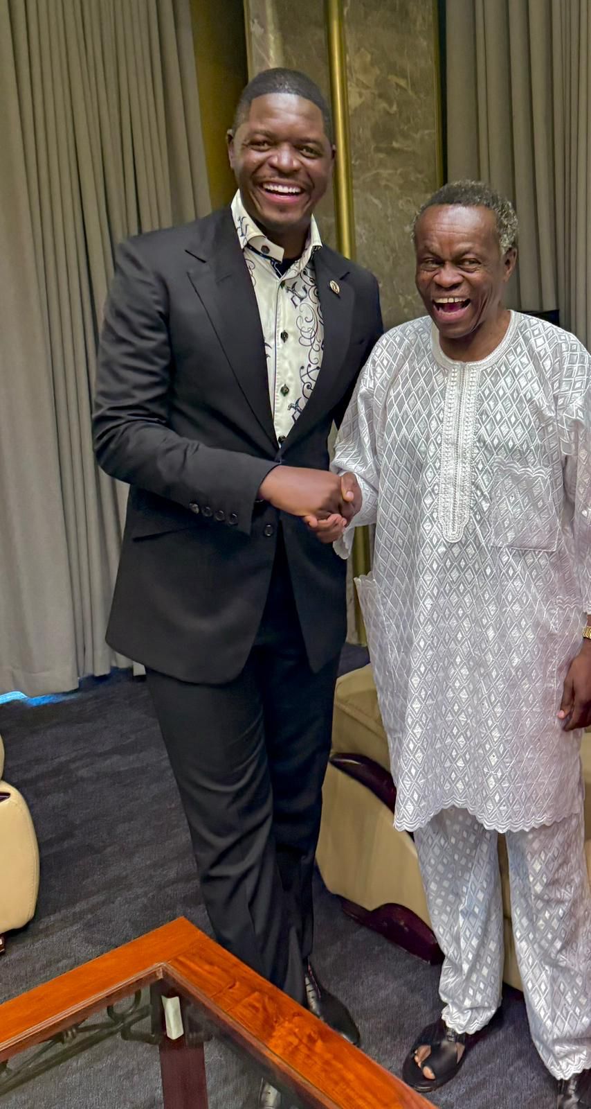 Shacky Timburwa and PLO Lumumba laughing together