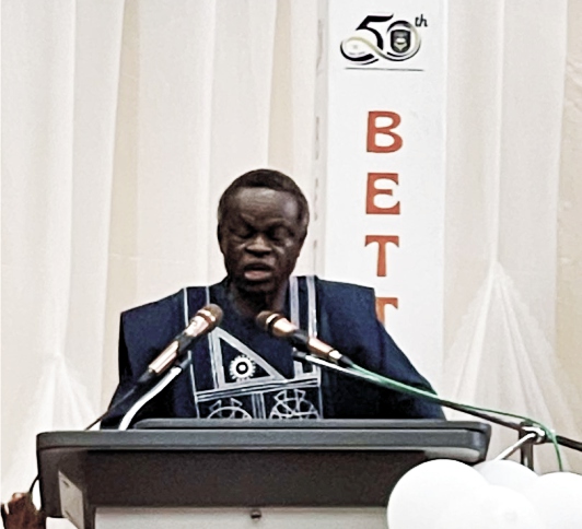 PLO Lumumba at a lectern during the University of Ilorin’s fiftieth anniversary lecture